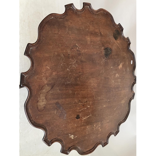 309 - Antique mahogany tea/wine table, the circular top having pie crust border, centre column support and... 