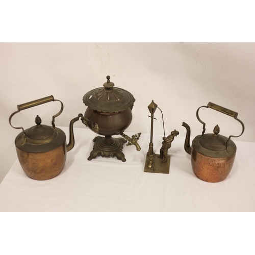 312 - A lot of copper and brass ware to include tea urn, kettles, etc.