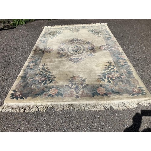 324 - Two drawing room rugs. (faded and stained)
280cm x 190cm approx.   270cm x 180cm approx.