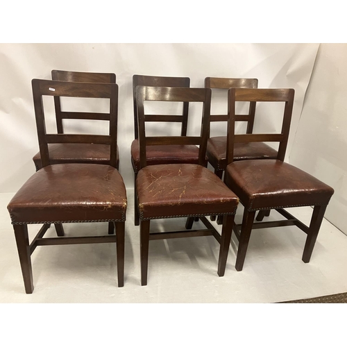 328 - A set of 6 antique mahogany dining chairs with old leather seats.