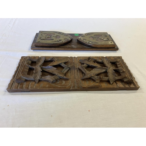 349 - A rosewood and brass mounted book ends and a carved oak book ends stamped Adel Boden. (2)