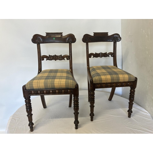 35 - A pair of Regency mahogany side chairs with drop in seats.