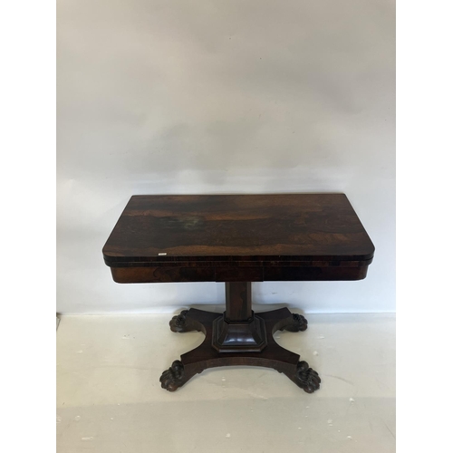 366 - Victorian rosewood card table, the folding rectangular top supported on centre column with platform ... 