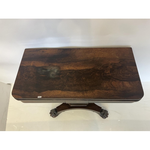 366 - Victorian rosewood card table, the folding rectangular top supported on centre column with platform ... 