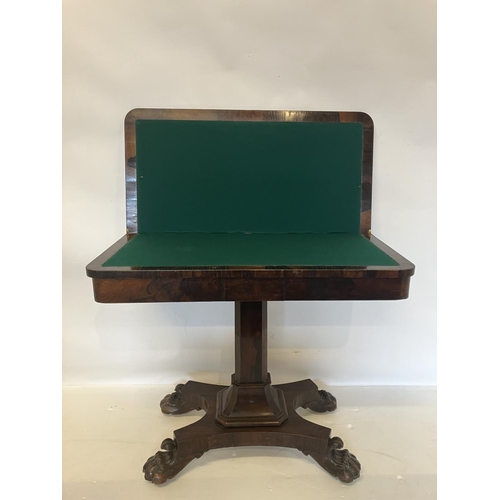 366 - Victorian rosewood card table, the folding rectangular top supported on centre column with platform ... 