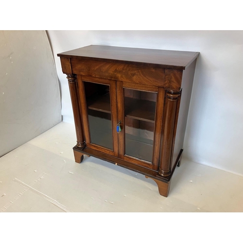 40 - 19th century mahogany cabinet fitted with a drawer over doors with glass panels and side columns. W.... 