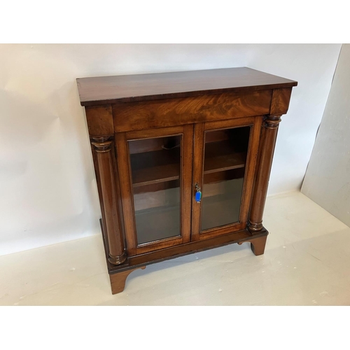 40 - 19th century mahogany cabinet fitted with a drawer over doors with glass panels and side columns. W.... 