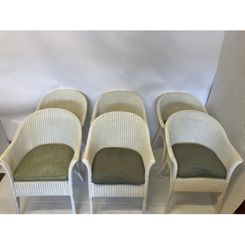 50 - Lloyd Loom - A set of 6 tub shaped dining/easy chairs.