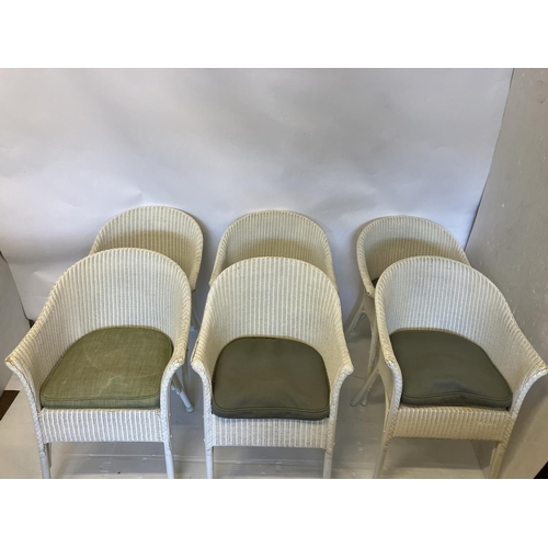 50 - Lloyd Loom - A set of 6 tub shaped dining/easy chairs.