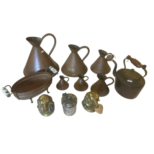 57 - Set of 6 graduated copper measures, copper kettle, brass book ends, etc.