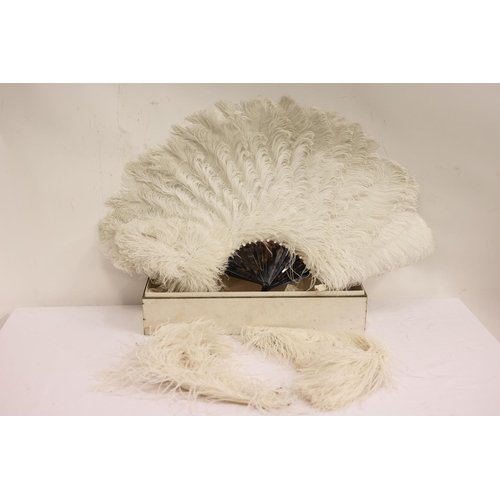 59 - A tortoise shell fan with ostrich feathers in original box by J. Duvelleroy, Paris & London.