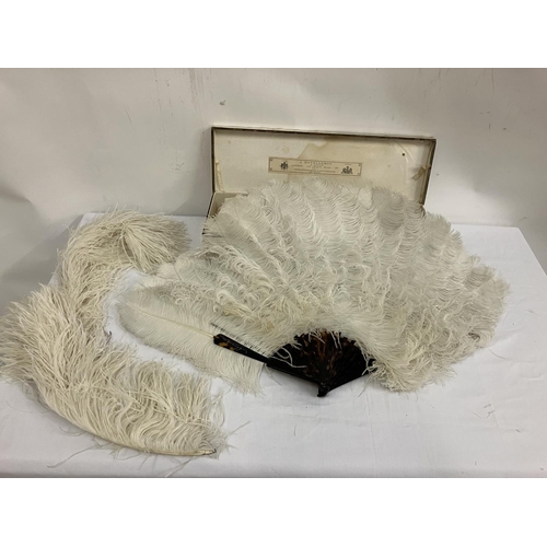 59 - A tortoise shell fan with ostrich feathers in original box by J. Duvelleroy, Paris & London.