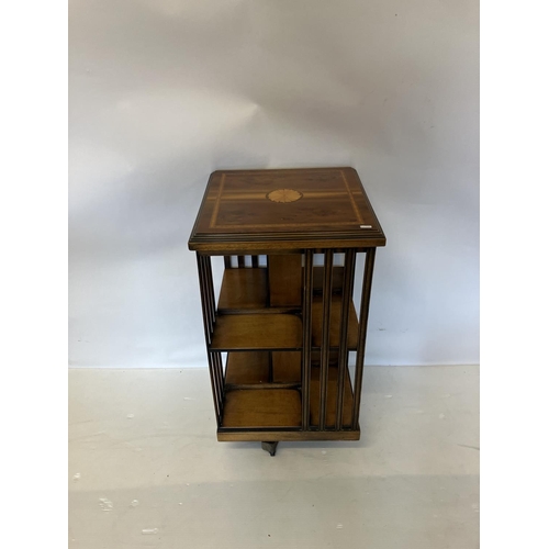 94 - Inlaid mahogany revolving bookstand. H. 87cm, W. 45cm, D. 45cm.