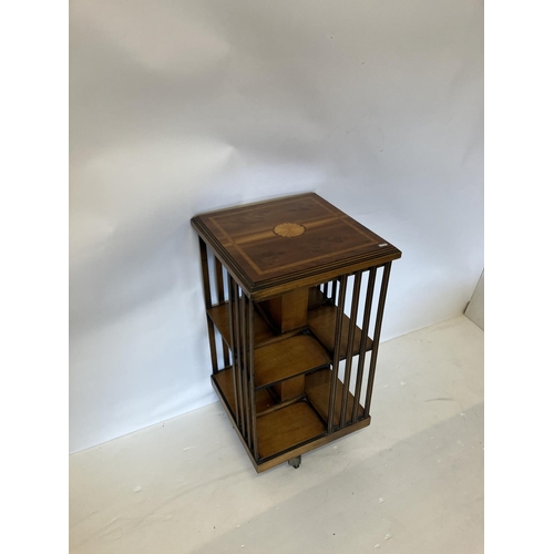 94 - Inlaid mahogany revolving bookstand. H. 87cm, W. 45cm, D. 45cm.