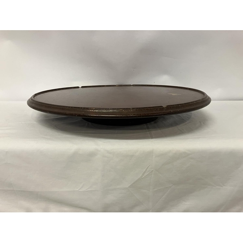 104 - Large antique mahogany lazy susan. Diameter 62cm.