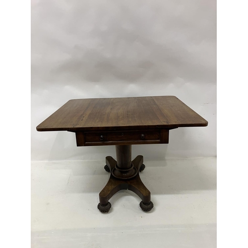 105 - A 19th century rosewood drop leaf table fitted with real & dummy drawers and raised on centre column... 