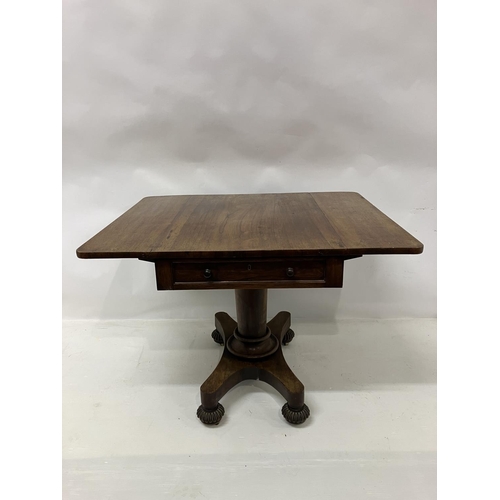 105 - A 19th century rosewood drop leaf table fitted with real & dummy drawers and raised on centre column... 