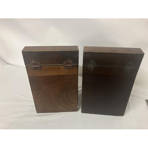 113 - A rare pair of Georgian mahogany knife boxes complete with their original interiors (base board miss... 