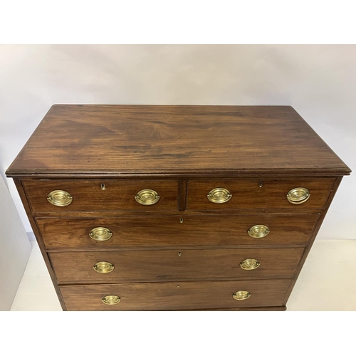 114 - Georgian mahogany chest of 2 short and 3 long drawers having oval shaped brass handles and raised on... 