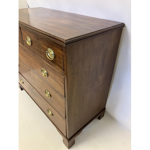 114 - Georgian mahogany chest of 2 short and 3 long drawers having oval shaped brass handles and raised on... 