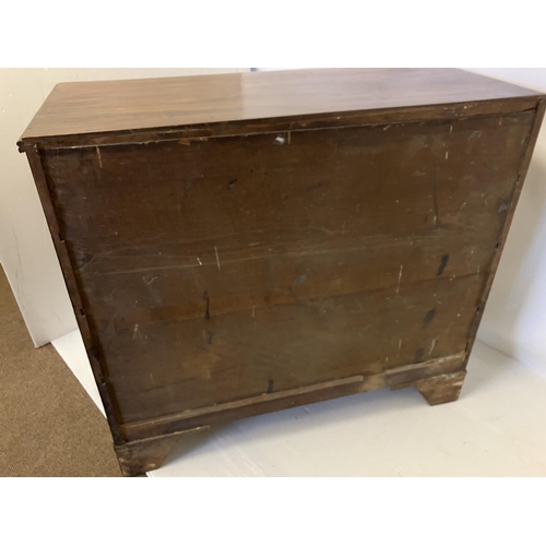 114 - Georgian mahogany chest of 2 short and 3 long drawers having oval shaped brass handles and raised on... 