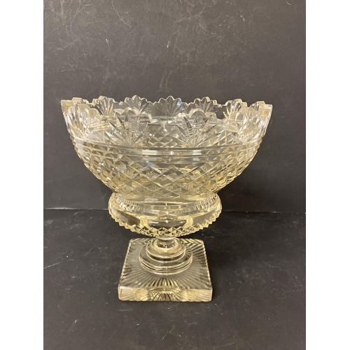 116 - A fine heavy cut glass bowl on square base. Diameter 23cm, H. 23cm.