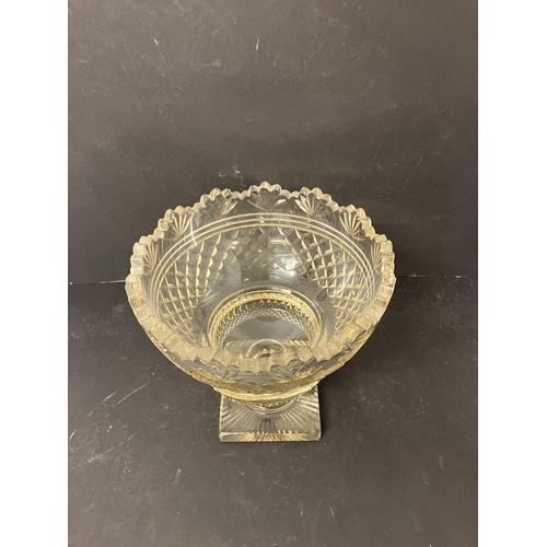 116 - A fine heavy cut glass bowl on square base. Diameter 23cm, H. 23cm.