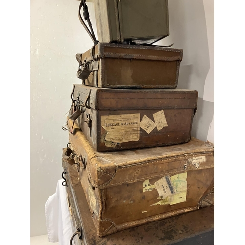 123 - Large metal trunk, 3 leather cases and a metal Army box.