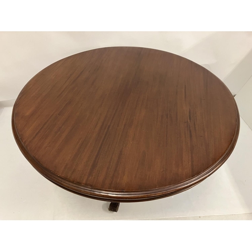 127 - Victorian mahogany circular centre table on well carved pod support. Diameter 116cm approx.