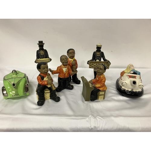 13 - Collection of pottery jazz musicians and 2 teapots in the form of cars.