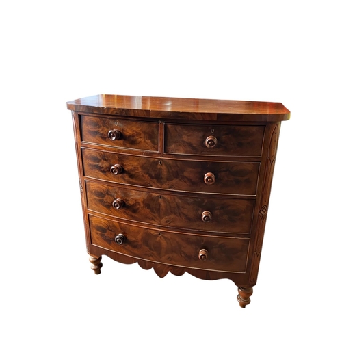 132 - A 19th century mahogany bow shaped chest of 2 short and 3 long drawers, carved side panels and raise... 