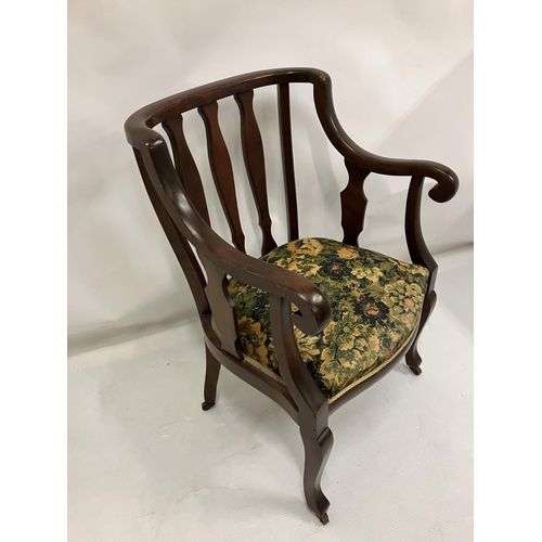 136 - Mahogany easy chair.