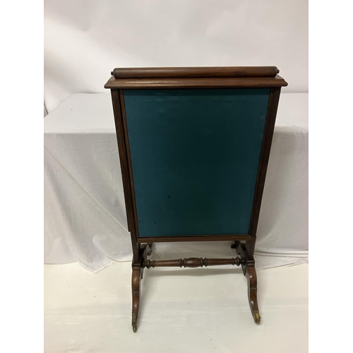 141 - 19th century mahogany framed screen with lift up and pull out side panels.