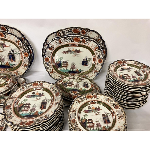 144 - A large antique Mason's ironstone dinner service in the Chinese style. Over 100 pieces.