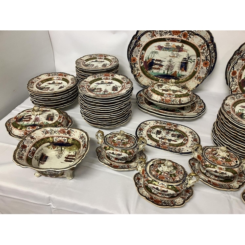 144 - A large antique Mason's ironstone dinner service in the Chinese style. Over 100 pieces.