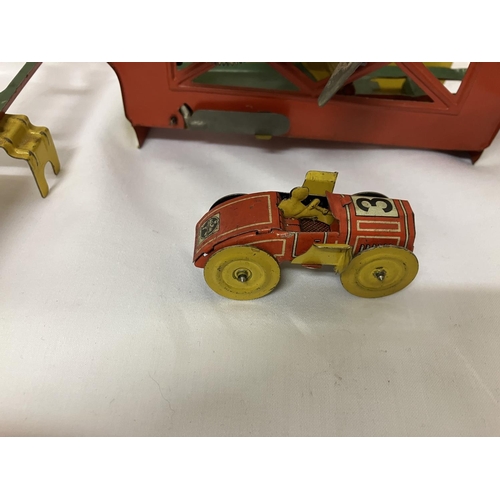 150 - Old tin metal toy with racing car.