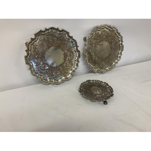 161 - A pair of antique Sheffield plated circular salvers with pie crust border together with a smaller ma... 