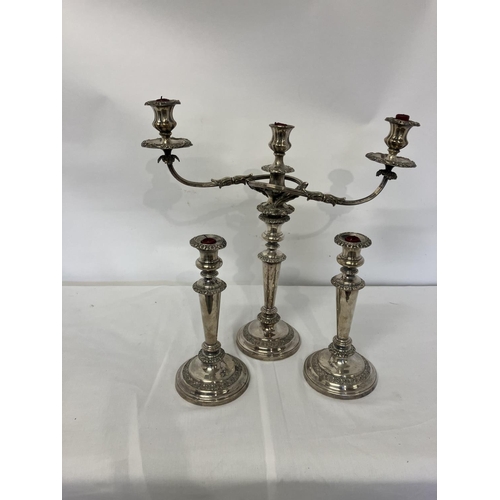 162 - Old Sheffield plated 3 b ranch candleabra together with a pair of matching candle sticks.