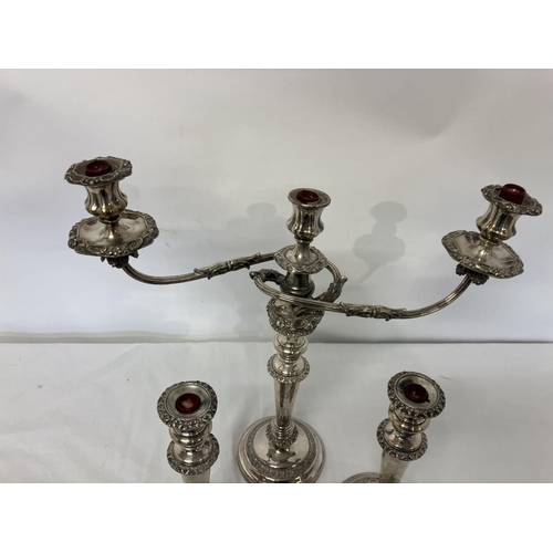 162 - Old Sheffield plated 3 b ranch candleabra together with a pair of matching candle sticks.