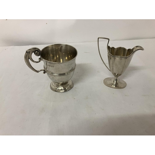 167 - English silver christening mug, London 1898, 6.5 troy ozs together with a silver cream jug, London 1... 