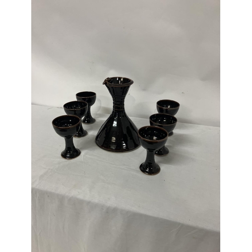 17 - A Louis Mulcahy wine decanter and 6 goblets.