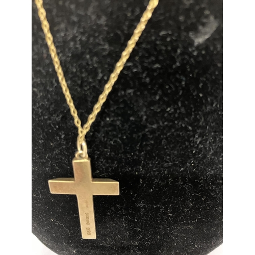 206 - 9ct gold cross and chain.