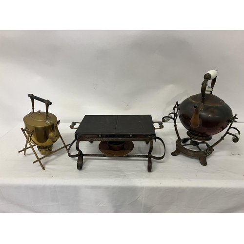 21 - Old metal warming stand and a copper and brass spirit kettles.