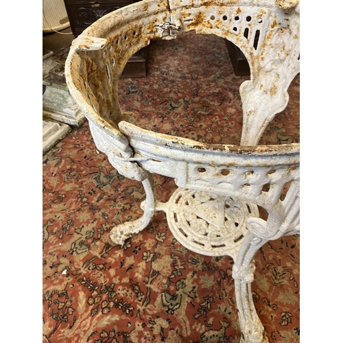 225 - Antique cast iron garden table with stone top, the table has a few old repairs and the stone top is ... 