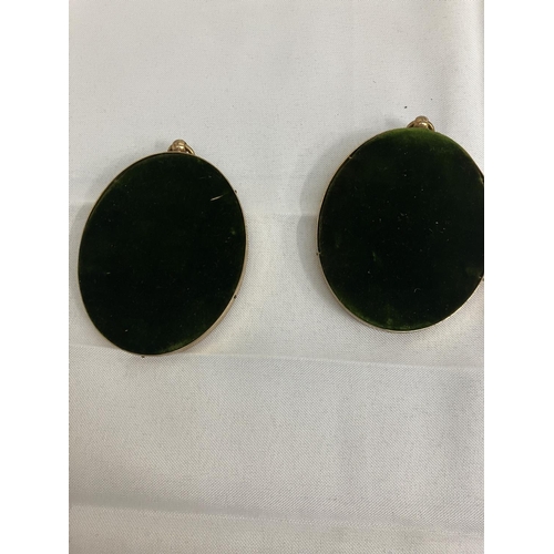 237 - Pair of oval shaped miniatures, Lady & Gent in brass frames.