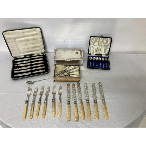 244 - Silver plated cigarette box; a set of 6 fruit knives cased, Sheffield 1933; a set of 6 coffee spoons... 