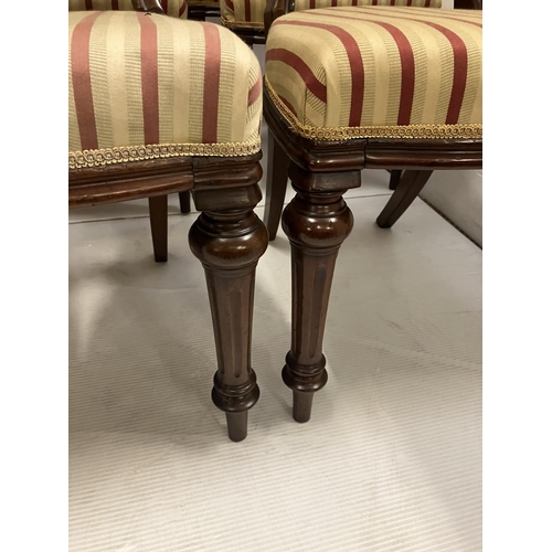 254 - A good set of 12 19th century mahogany dining chairs, nicely upholstered.