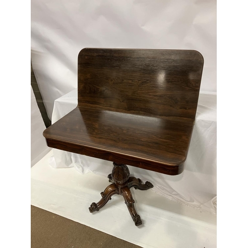 259 - Victorian rosewood tea/card table, the rectangular folding top raised on carved turned column and 4 ... 