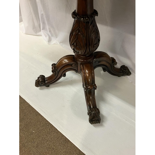 259 - Victorian rosewood tea/card table, the rectangular folding top raised on carved turned column and 4 ... 