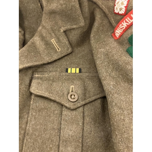 266 - A World War II Military Uniform - jacket, trousers, belt (insignia removed) and two other jackets.